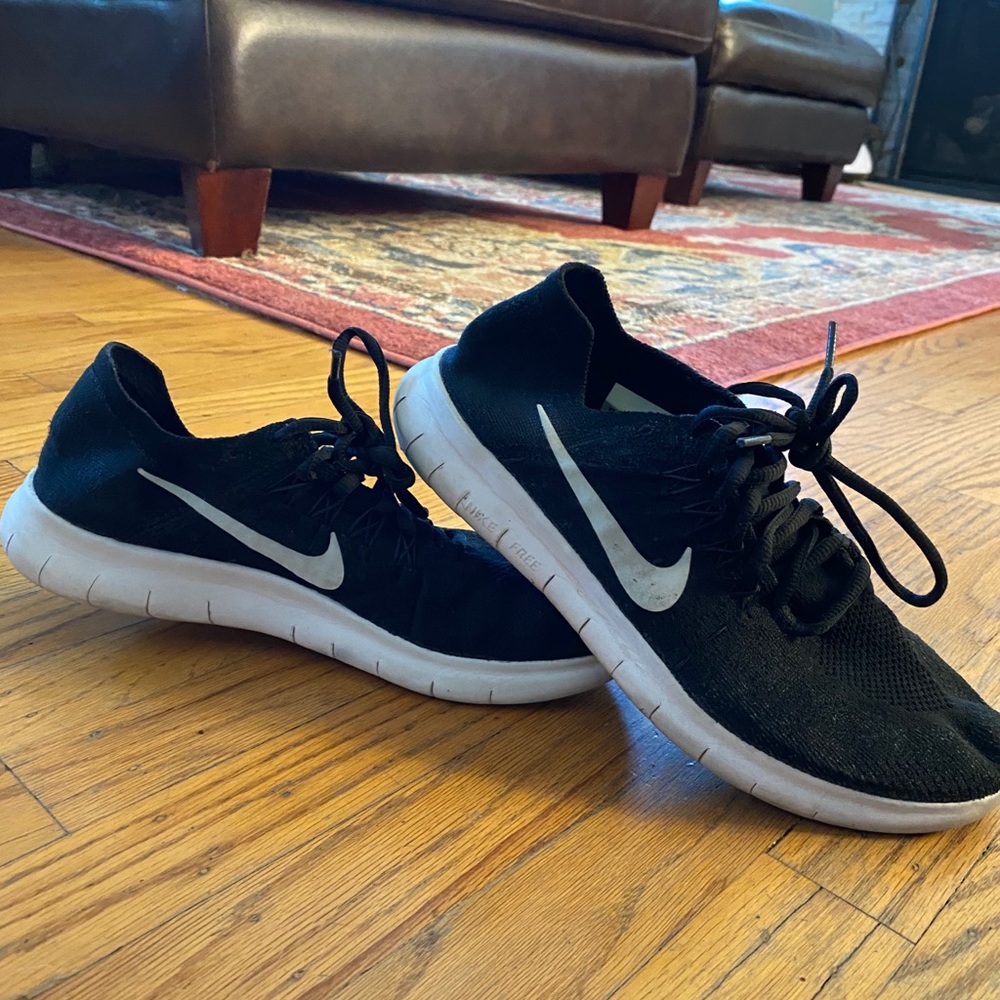 Black Nike running shoes